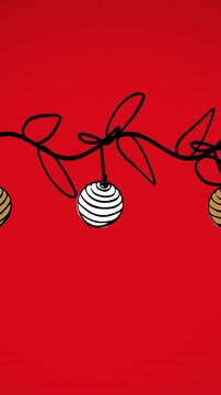 Animation of bauble swinging on leaves against red background
