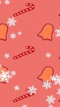 Animation of snow falling over christmas bell and candy cane pattern on red background