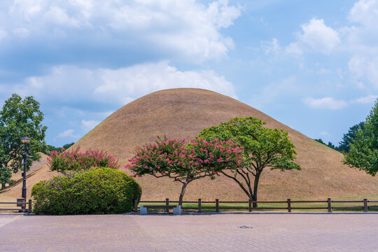Historical burial mounds of ancient kings at Daereungwon Tomb Complex, a popular UNESCO World Heritage tourist destination in Gyeongju, South Korea.
