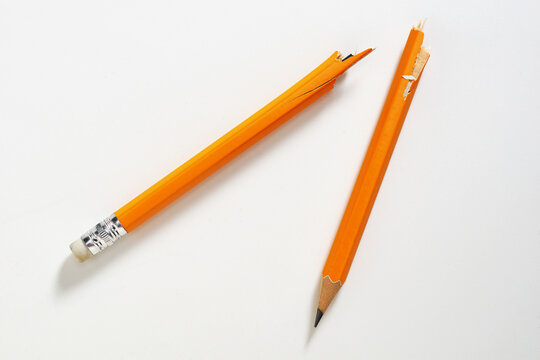 Broken Yellow Pencil on White