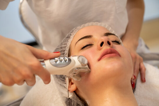 Close up of woman receiving anti aging lpg endermologie skin tightening procedure