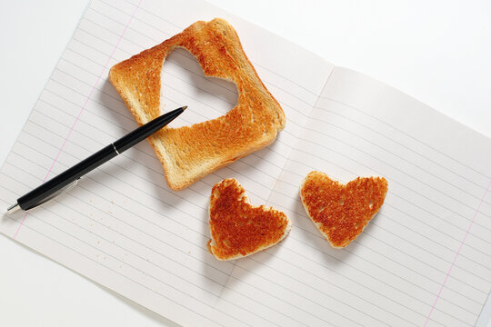 Heart Shaped Toast on Notebook