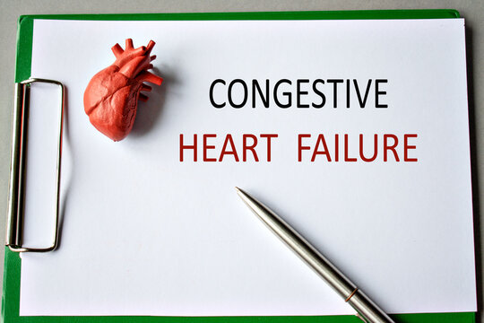 The inscription CONGESTIVE HEART FAILURE is depicted on a white sheet with a model of the heart