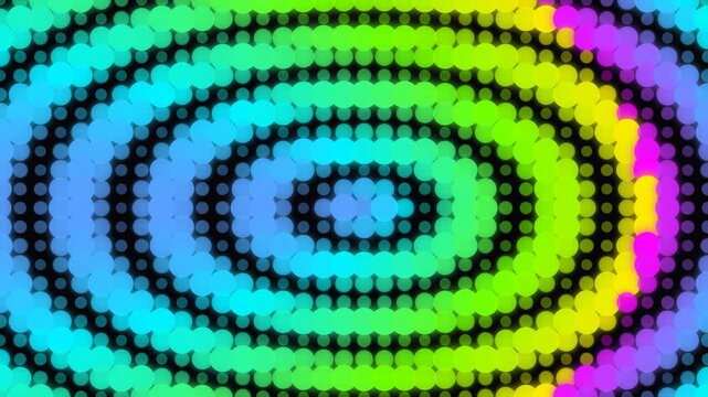 Abstract rainbow circles motion background with colorful glowing dot pattern animation