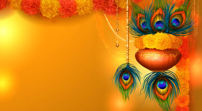 Krishna Janmashtami festivities featuring suspended dahi handi adorned with peacock feathers and marigold