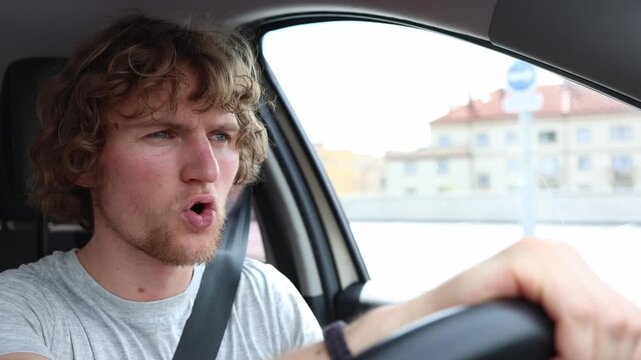 Nervous driver feels mildly anxious while driving through the city staying focused on the roads and traffic while trying to stay calm and confident throughout the journey
