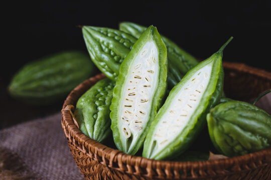 Fresh bitter melons on the dark background