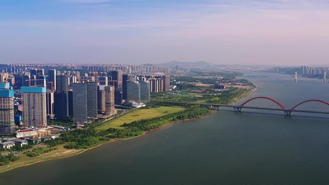 Aerial view of red arch bridge over Xiang River in Changsha, Hunan in Changsha, Hunan, China