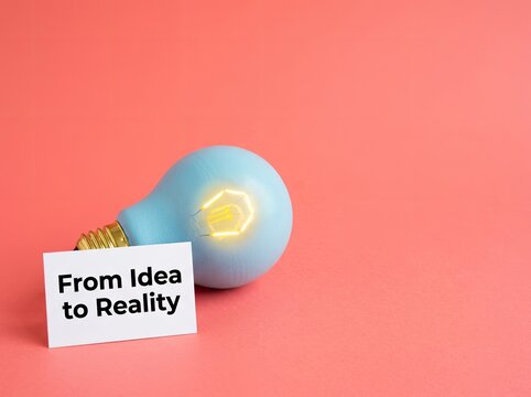 Light bulb with From Idea to Reality card on pink background suitable for business innovation symbolizing turning creative vision into success