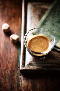 Cup of coffee on rustic wooden background. Soft focus. Copy space