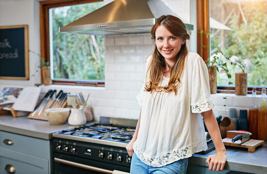 Relax, woman and smile in kitchen portrait for weekend break, peaceful morning and unwind. Wellness, happy person and calm in home for holiday downtime, comfortable day off and good mood for me time