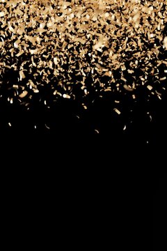 Confetti falls from above in a golden color, creating a festive atmosphere on a dark backdrop. The scene is perfect for celebrations or special events, inviting creativity
