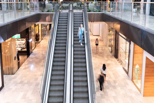 escalator in a modern shopping centre long exposure