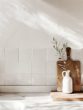 Aesthetic product listing template for kitchenware. On the right, a smooth white marble kitchen countertop edge with a small wooden cutting board and a tiny olive branch
