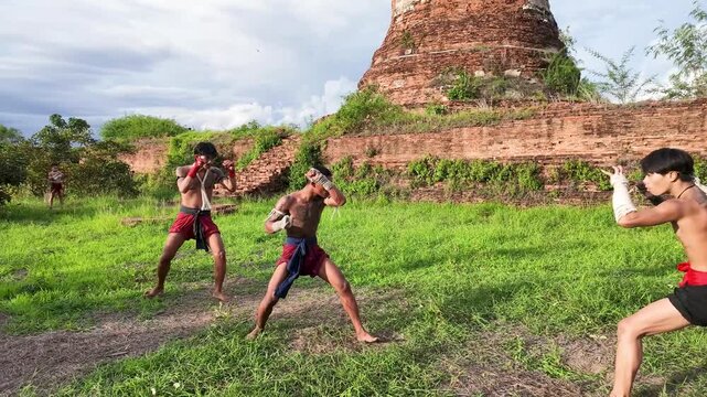 Muay Thai Fighters Training in Front of Ayutthaya Ancient Temple