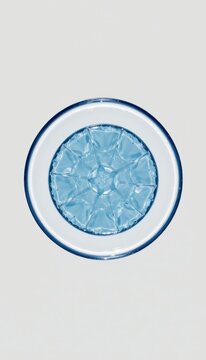 Geometric hydration circle shapes revealing a clean minimal water core are framed in a clean minimalist silhouette view