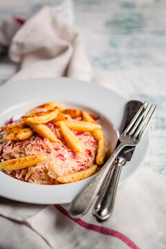 Finger-shaped potato dumplings with sauerkraut ready to eat