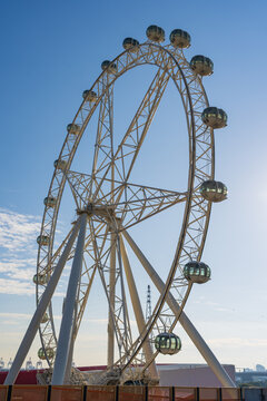 Gondola capsule around the edge of a large sight seeing ferris wheel