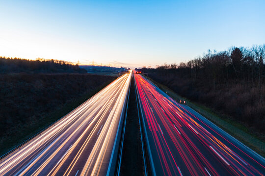 Germany, Baden-Wuerttemberg, Autobahn A8 near Wendlingen in the evening, light trails