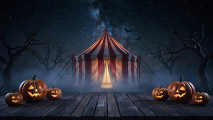 Naklejka premium Halloween Pumpkin Circus Tent Under Starry Night Sky with Bats