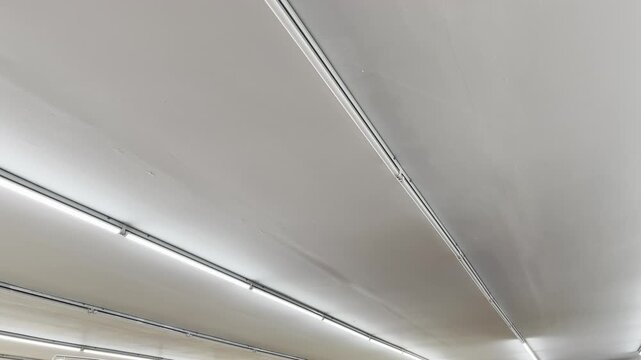 Damaged ceiling indoor with peeling paint
