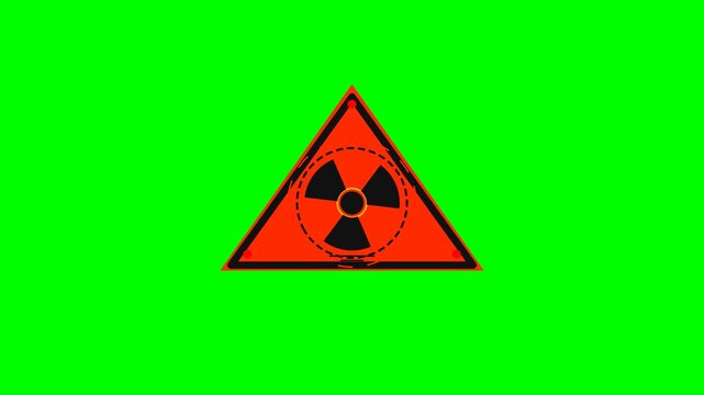 Radiation hazard warning sign on a green background
