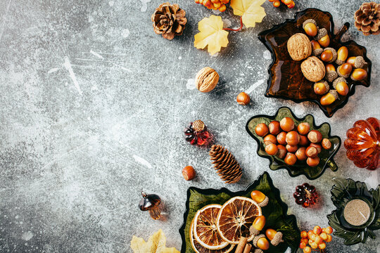 Autumn right side border with leaf glass dishes on concrete table