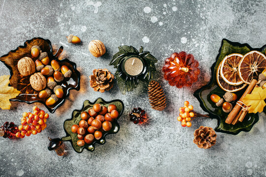 Autumn background layout with leaf glass bowls and autumn decor