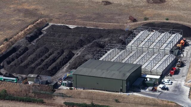 Aerial view of a composting facility with windrows
