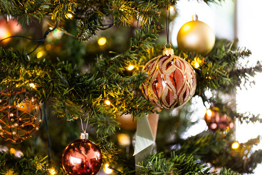 Christmas tree bauble decoration and star on tree