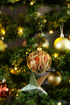 Christmas tree bauble decoration and star on tree