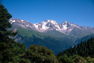Fototapeta premium Udziro Lake trekking trail in Racha mountains, Georgia. Caucasus mountain range landscapes