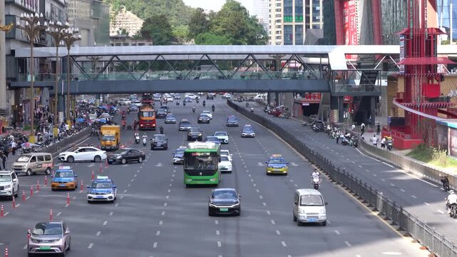 Busy multilane city road with pedestrian overpass in China