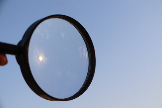 World Exploration Concept with Magnifying Glass Focused on Global Details