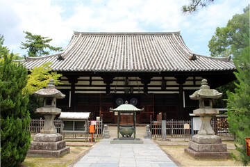 Fototapeta premium Main Hall Hondo and Courtyard Path at Sanuki Kokubunji Temple on Shikoku Henro Pilgrimage, Kagawa, Japan 2026