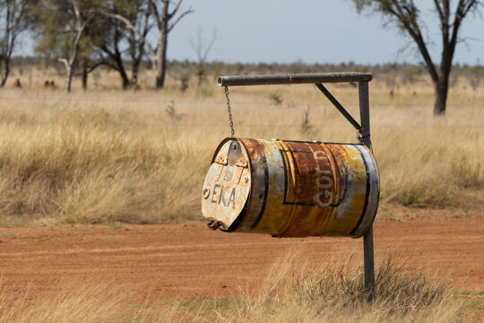 Mailbox made from a 200lt drum on a dirt road