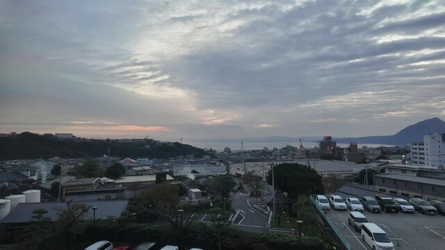 Hot spring steam rises over Kannawa Beppu at dawn.