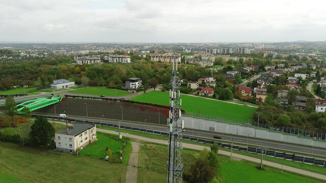 Communication antenna tower in open field