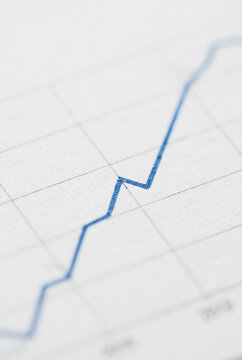 Blue line graph showing upward growth trend