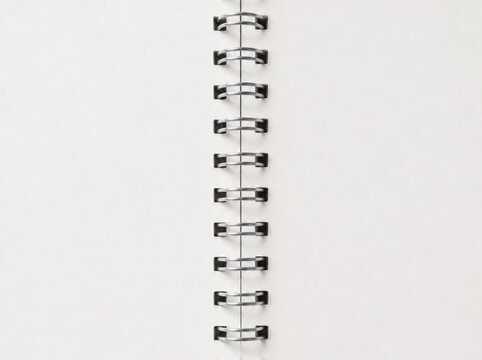 Blank open spiral notebook mockup with empty white page and ring binder for design backdrop