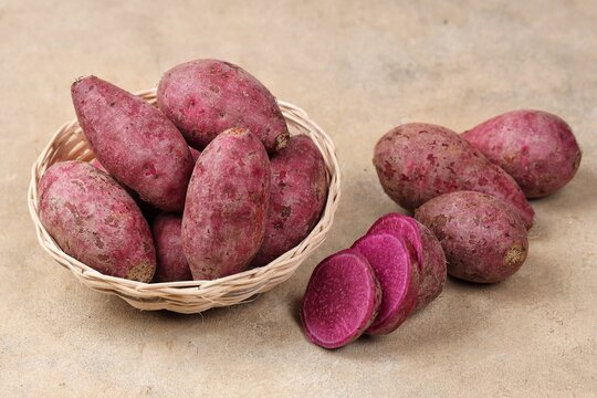  purple sweet potato or ubi ungu with naturally vibrant purple flesh and a mildly sweet flavor.
