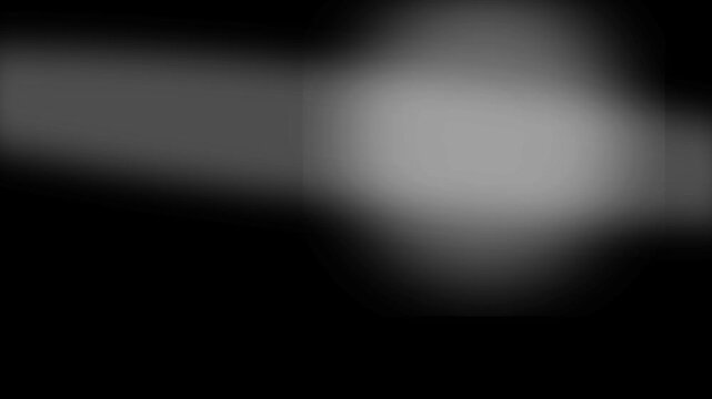 White blurred light on black background. 2d animation