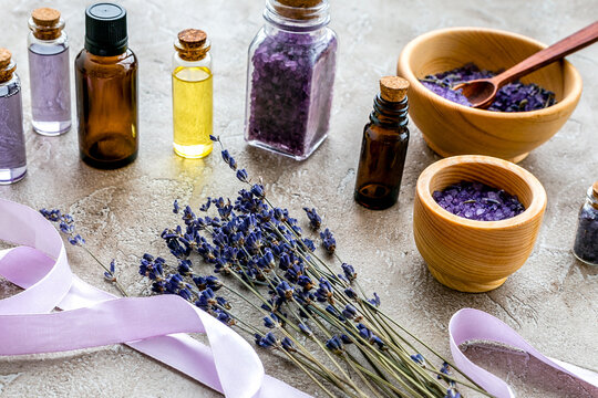 organic cosmetics with lavender on wooden background