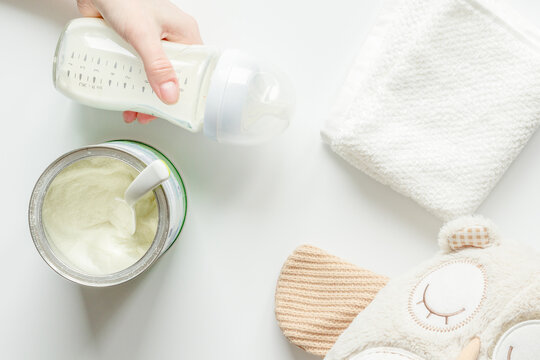 preparation of mixture baby feeding on white background top view