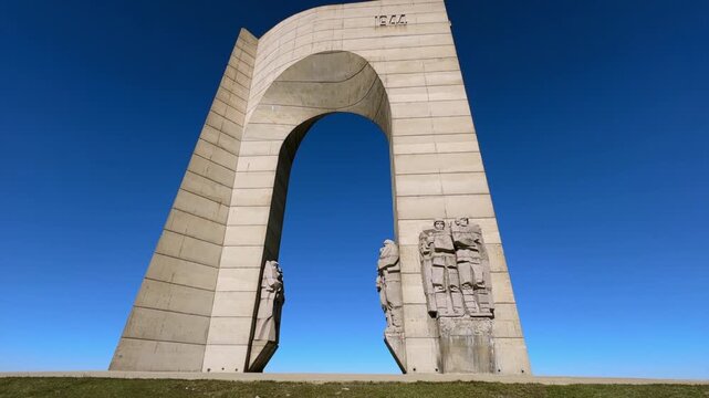 Impressive socialist realism style monument Arch of Liberty commemorating the fight against fascism, located in Beklemeto Pass, Bulgaria