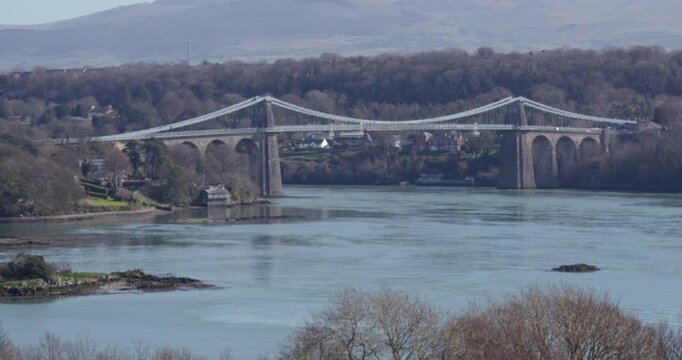 wide shot of the Menai suspension bridge and Menai Strait from the Ffordd Caergybi, Llanfairpwllgwyngyll