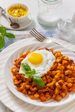 Diced fried potatoes cooked with cubed sausage