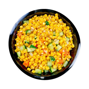Bright salad made of sweet corn kernels, diced cucumbers, carrots, and crunchy pine nuts tossed in a light dressing. Fresh salad, crunchy vegetables, salad bowl, vegetarian food.