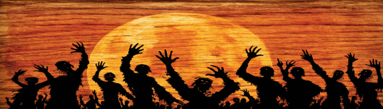 Zombie silhouette Halloween full moon background with spooky hands raised in night