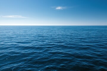 Fototapeta premium Azure water and blue sky horizon: peaceful seascape with gentle waves